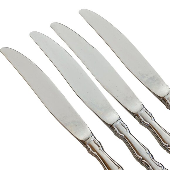 4 Oneida Deluxe Mozart Dinner Knife scalloped edge baroque scrolls 80s vtg stain - Picture 2 of 9